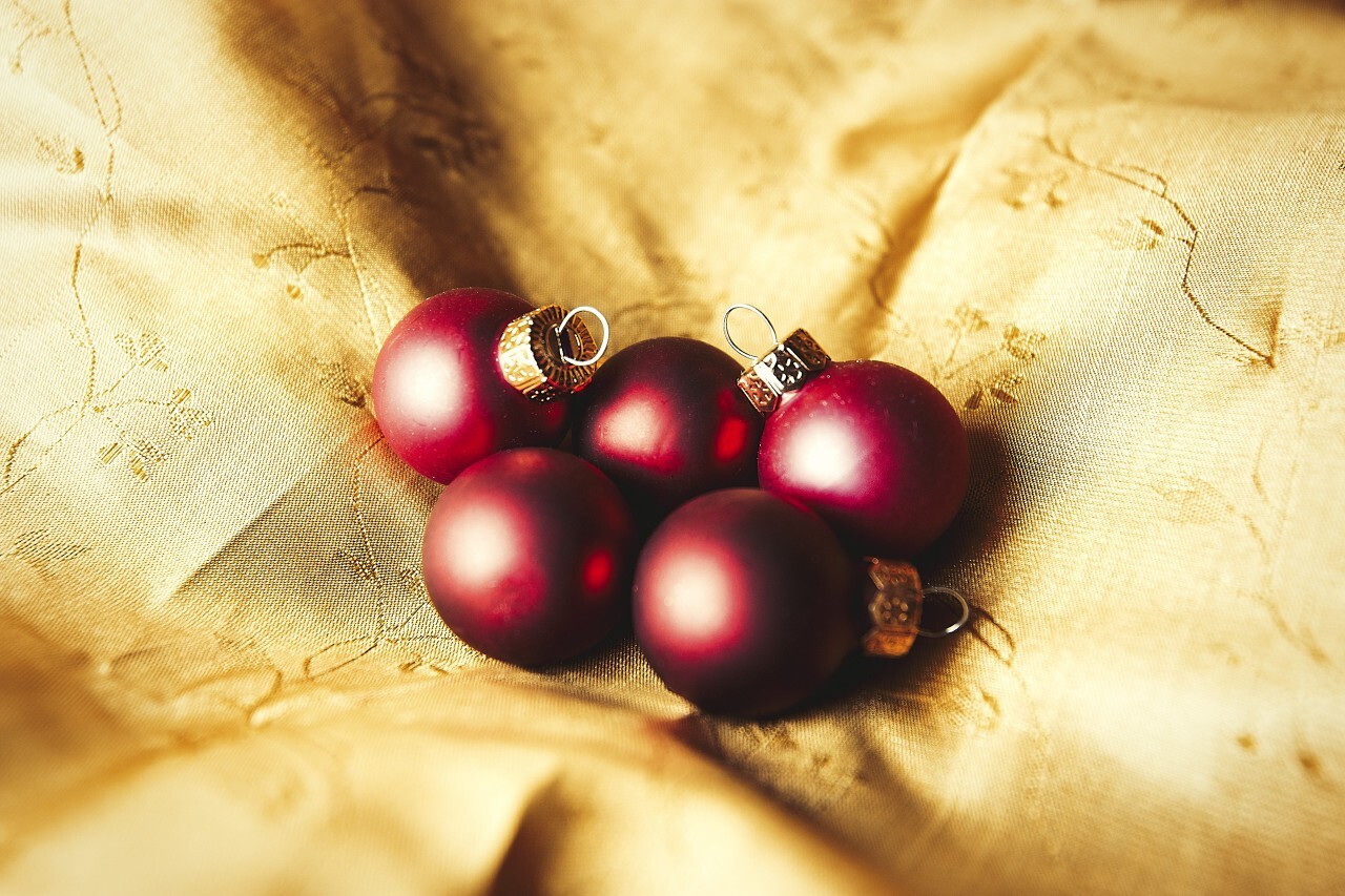 christmas balls on golden velvet