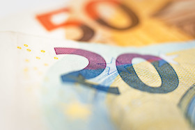 Stock Image: euro banknotes close-up - 20 euro and 50 euro background