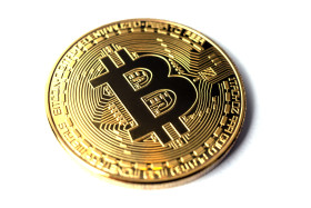 Stock Image: Golden bitcoin isolated on a white background