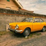 old yellow fiat car old yellow fiat car