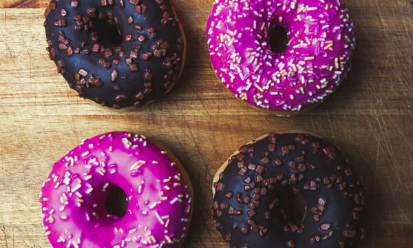 two chocolate donuts two pink donuts two chocolate donuts two pink donuts